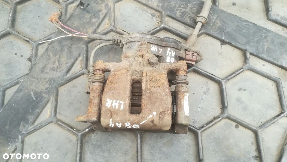 AUDI A4 B8 2.7 TDI ZACISK HAMULCOWY LEWY TYŁ - 2
