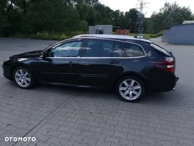 Renault Laguna 2.0 dCi Initiale - 9
