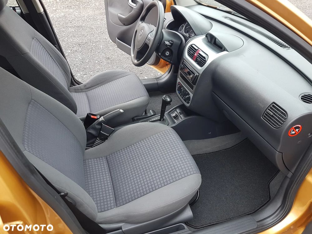 Opel Corsa 1.4 16V Enjoy - 14