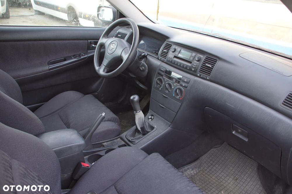 Auto na części - Toyota Corolla E12 1.4 VVT-i 97 KM 4ZZ-FE MTM 1C3 2002R Silnik Skrzynia Drzwi Maska Klapa Zderzak Błotnik Szyba Klamka Lampa Lusterko Deska Kokpit Sterownik Moduł Czujnik Licznik Panel Kierownica - 13