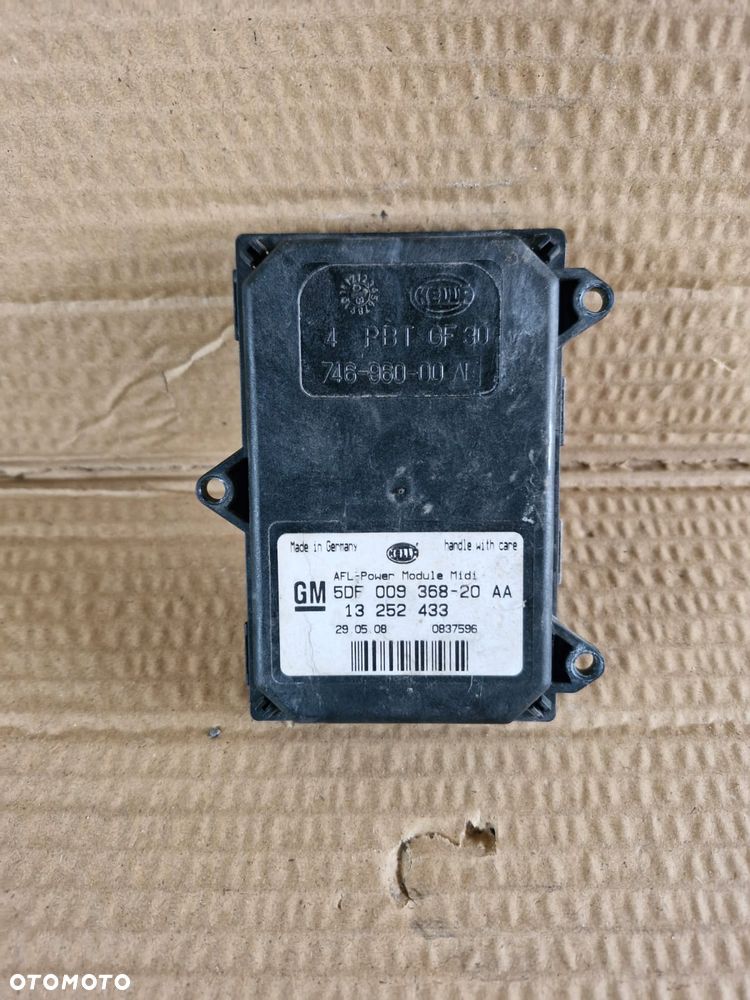 Moduł skrętu AFL XENON Opel Astra H III 13252433 - 1