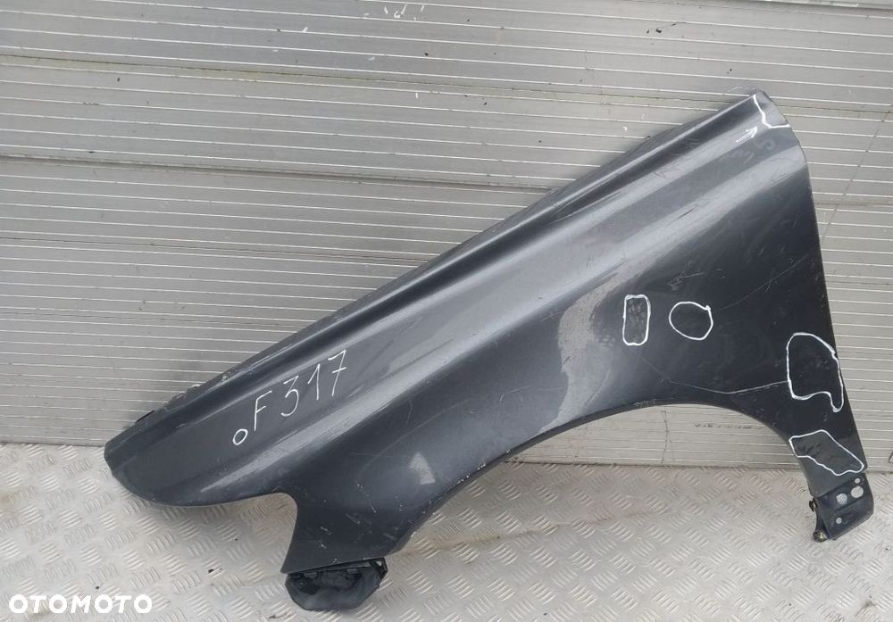 F317 LEWY BŁOTNIK VOLVO S40 V50 II - 1