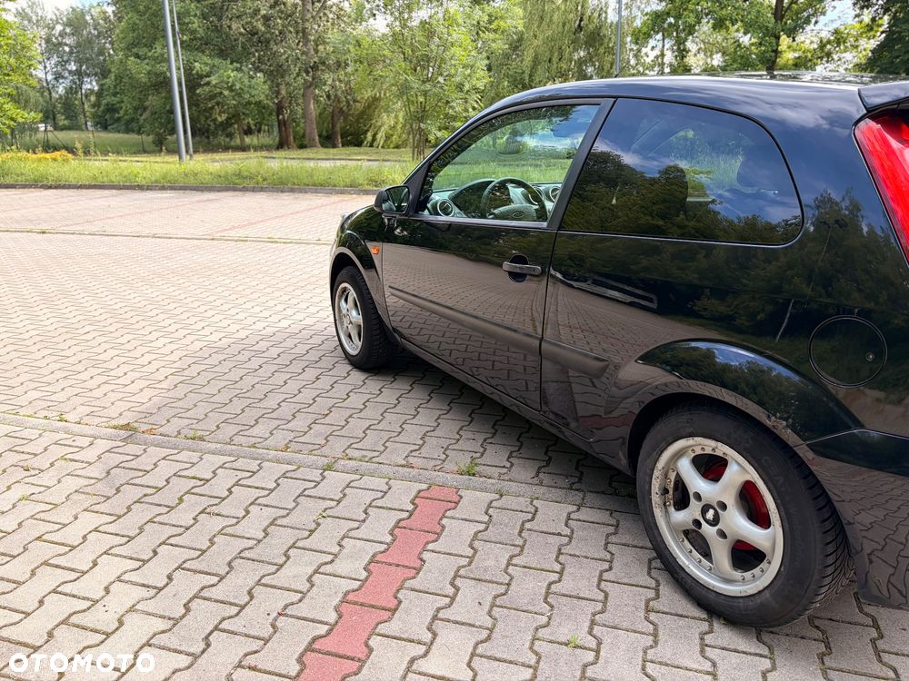 Ford Fiesta 1.4 Ghia - 4