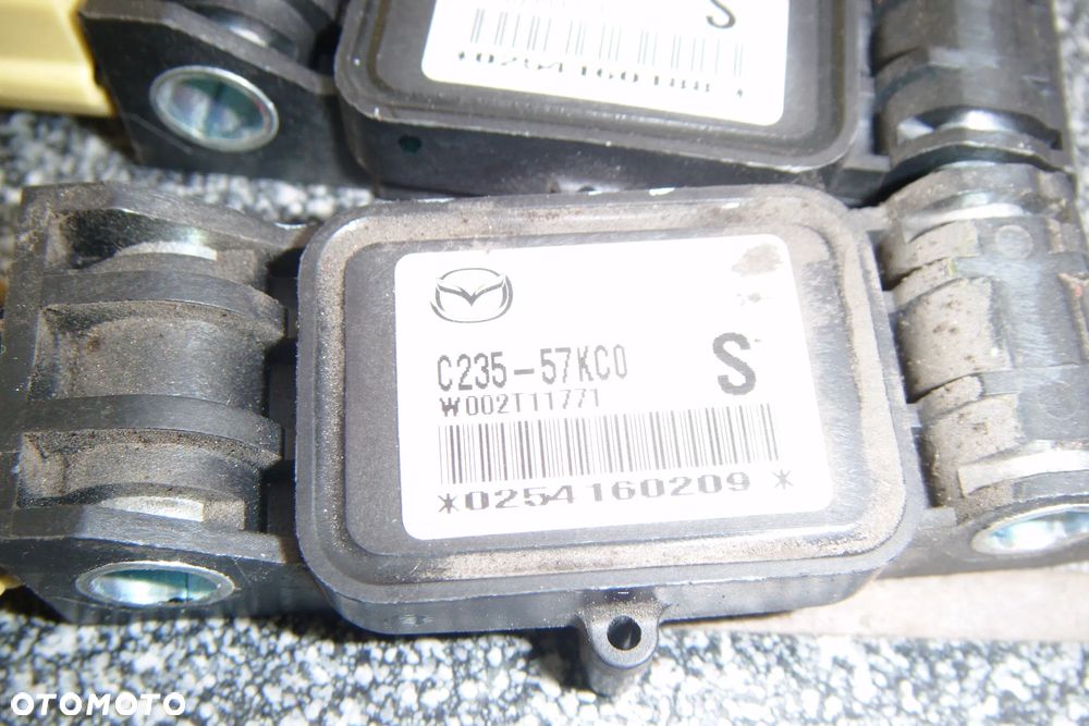 mazda 5 05r czujnik uderzenia bocznego  c235-57kc0 - 2