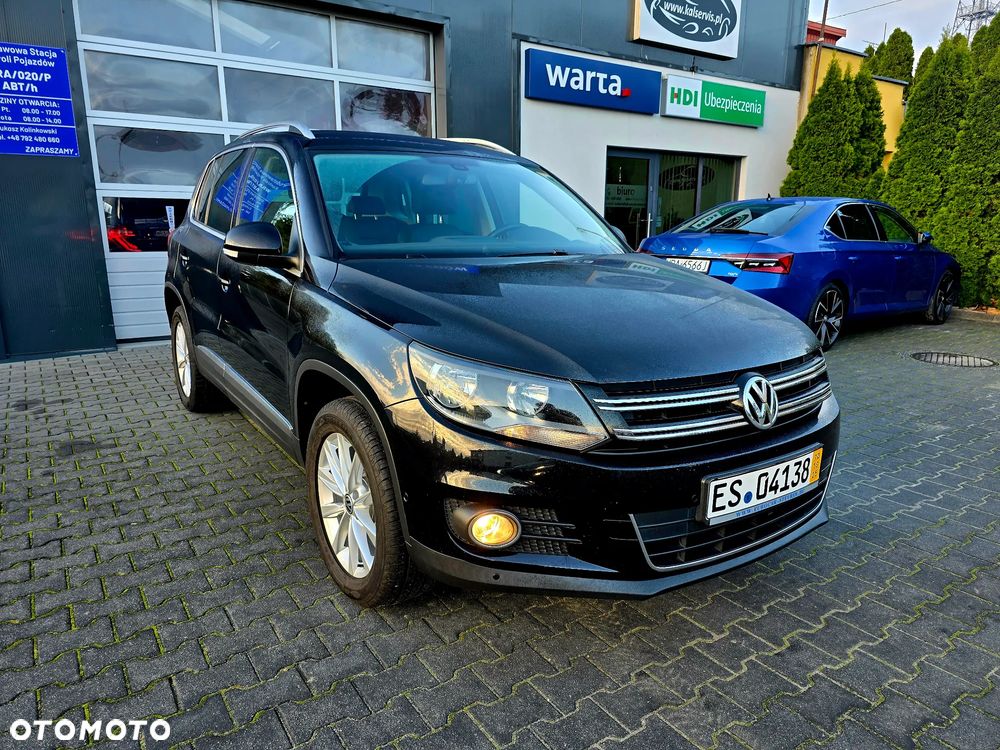 Volkswagen Tiguan 1.4 TSI 4Motion Exclusive - 1