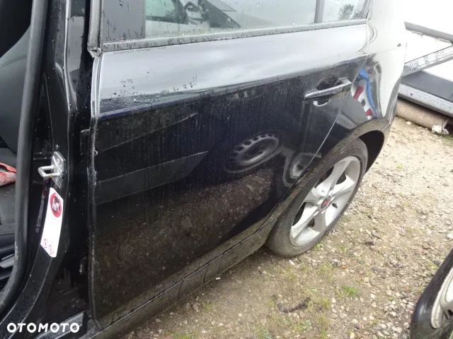 Kompletne tylne lewe drzwi BMW E87 668/9 - 2