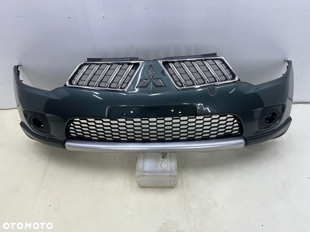 Zderzak przedni Mitsubishi Pajero Sport 2 L200 10-15r. Lift przód 6400B862