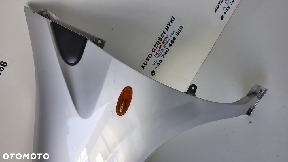 Nissan Almera Tino Błotnik Lewy Przód KL0 - 2