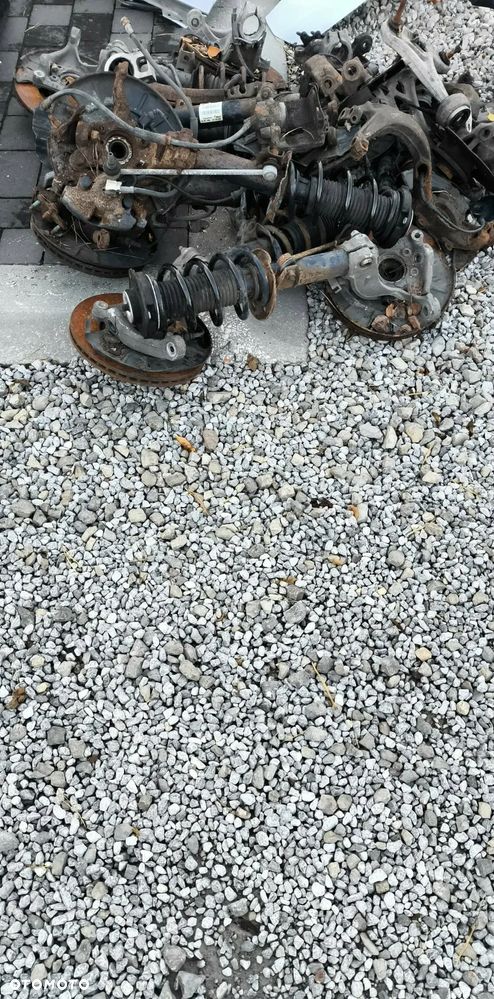 Amortyzator zwrotnica Audi A4 Passat B6 Golf V VI Skoda Mc Person - 2