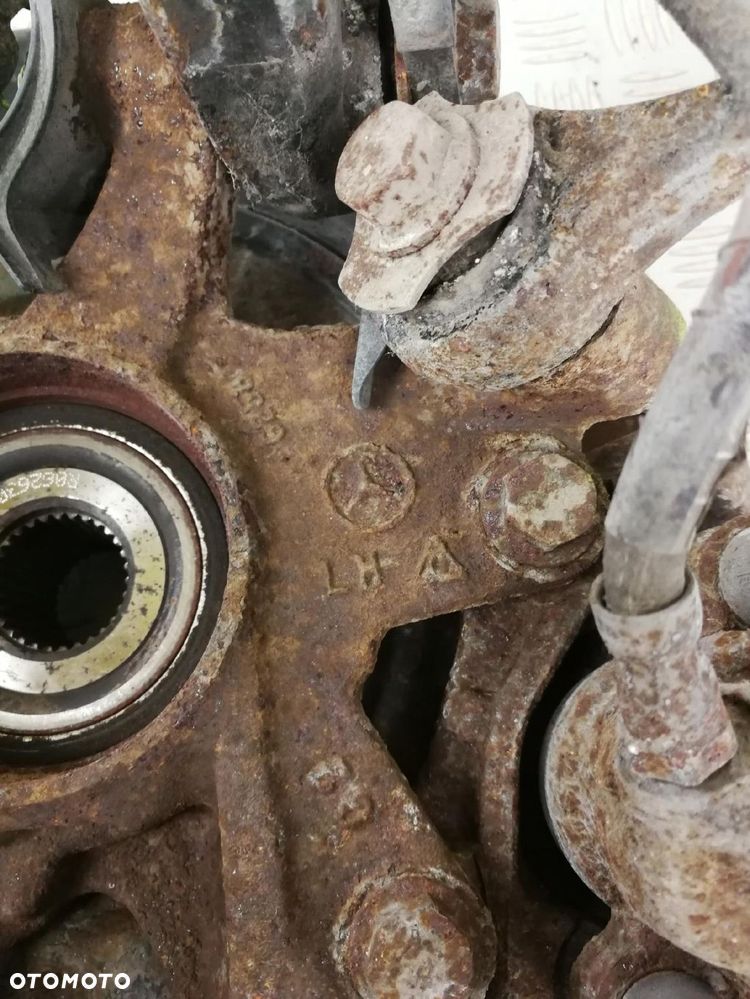 zacisk piasta zwrotnica wahacz lewa lewy tył MERCEDES W164 ML 3,0 CDI - 7