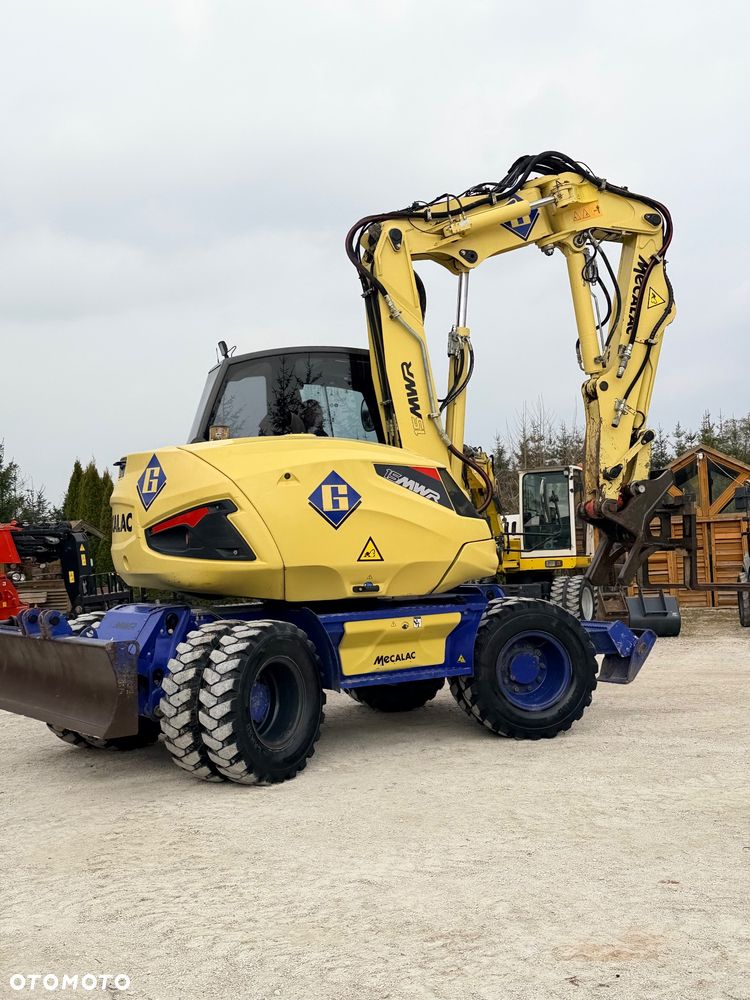 Mecalac Koparka 14 ton MECALAC 15 MWR koparko-ładowarka 3 łyżki widły 1 wł Centr.smarowanie Opony na BLIŹNIAKU 80%Camso ładowarka 714 12MTX 4x4 skrętne KLIMA kabina Premium silnik 146KM volvo EW140B DEUTZ szybka 35km/h - 2
