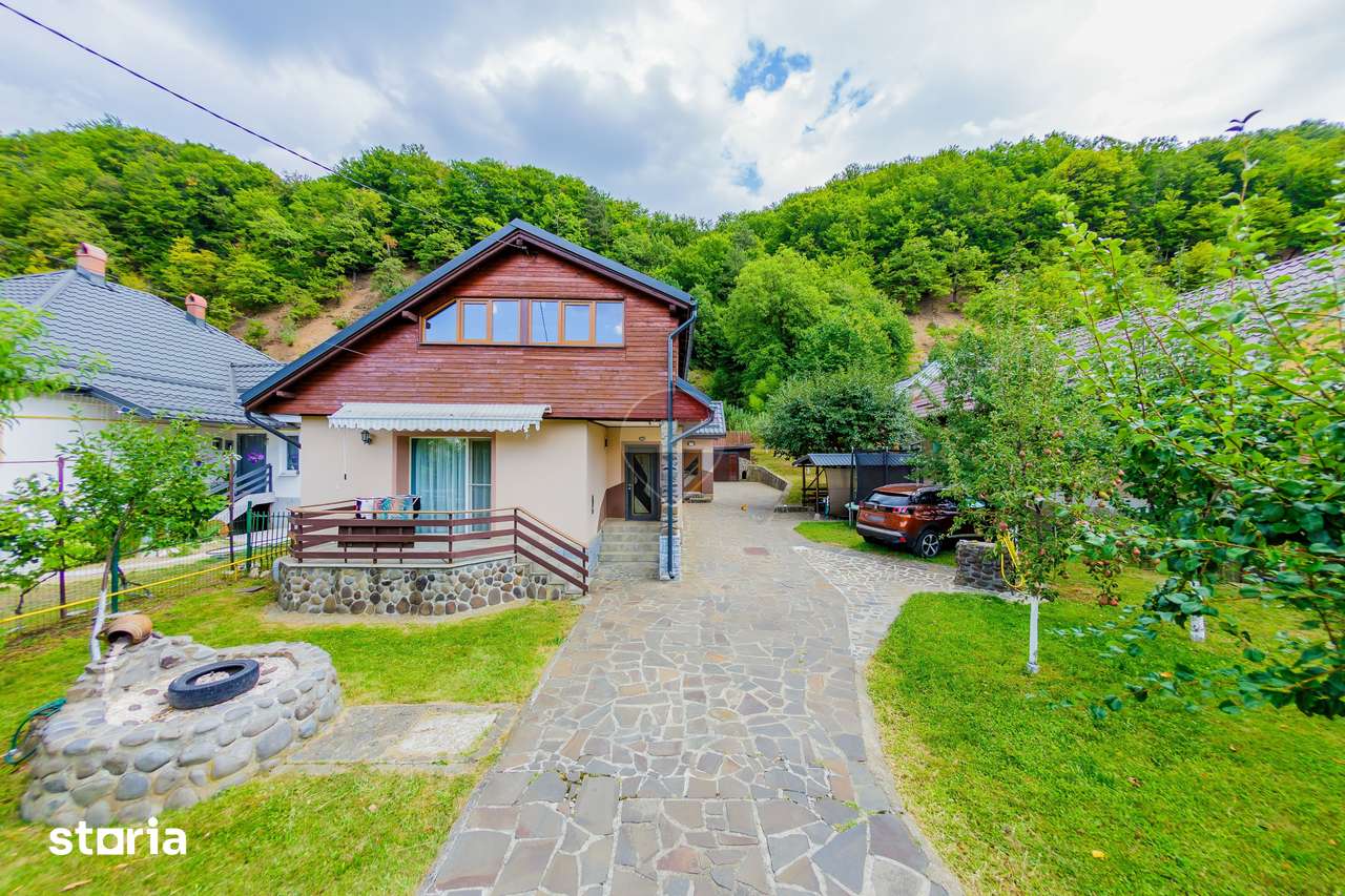 CASA cu TEREN generos , in linistea naturii