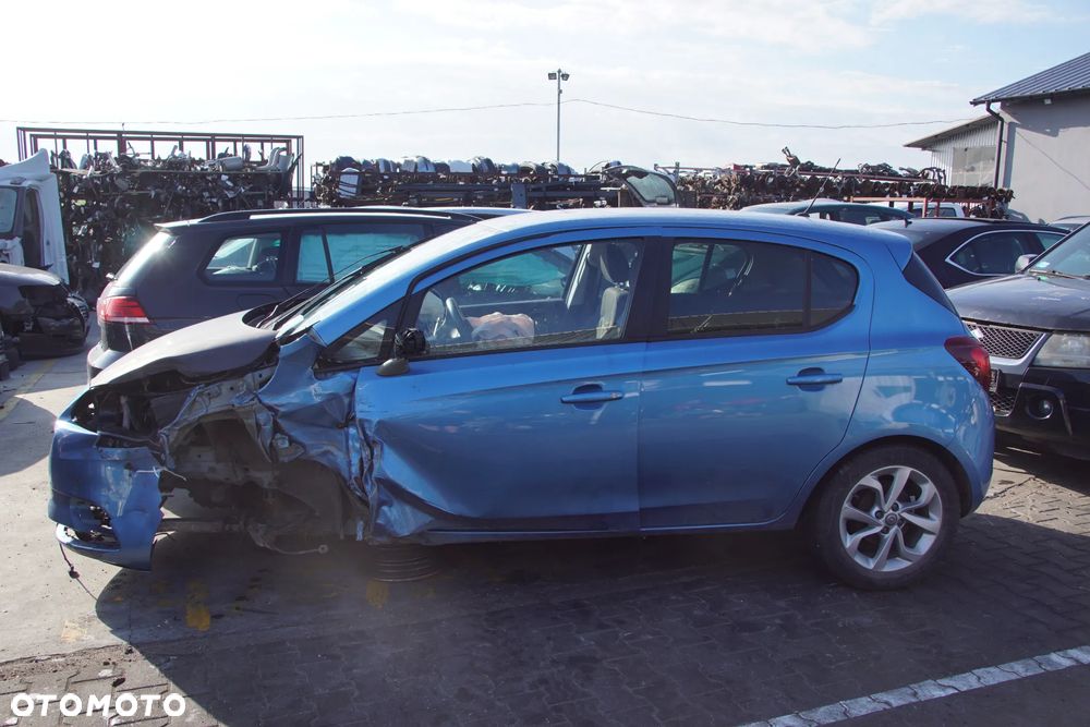 Auto na części - Opel Corsa E 1.4 Twinport 90 KM B14XEL F17 Z22V 2018R Silnik Skrzynia Drzwi Błotnik Zderzak Klapa Lampa Lusterko Klamka Szyba Deska Kokpit Sterownik Moduł Czujnik Licznik Panel Kierownica - 4
