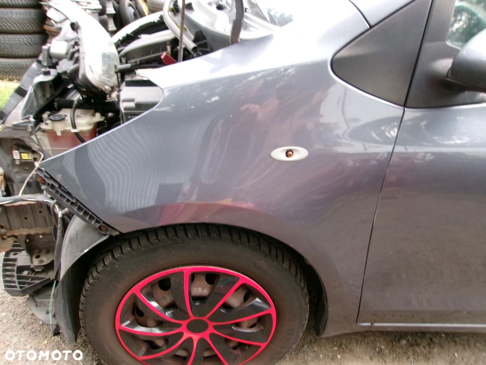 BŁOTNIK PRZÓD LEWY TOYOTA YARIS II  05-11 8S5 - 1