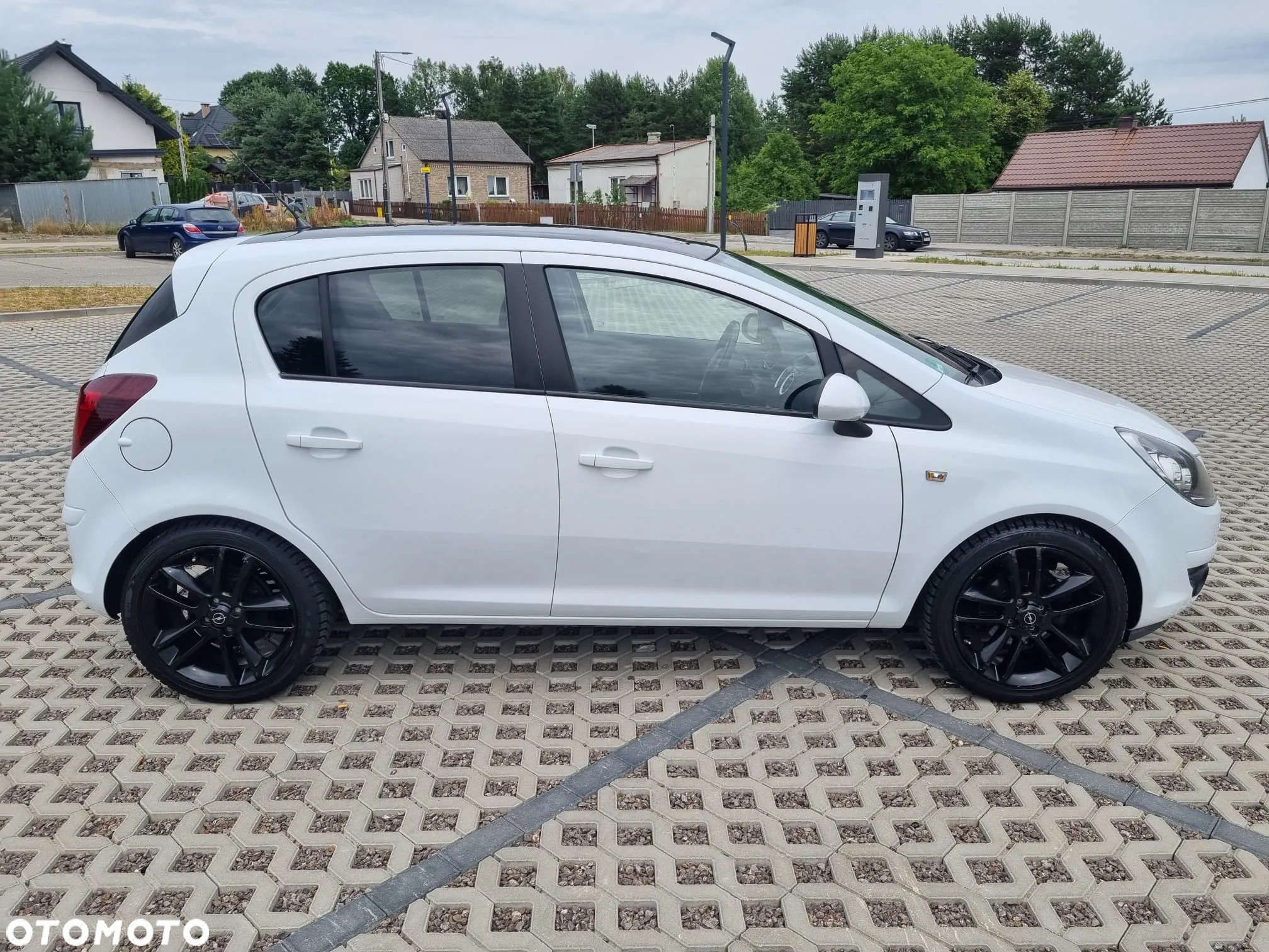 Opel Corsa 1.4 16V Cosmo - 9