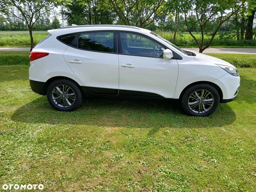 Hyundai ix35 1.7 CRDi 2WD blue Finale Gold - 8