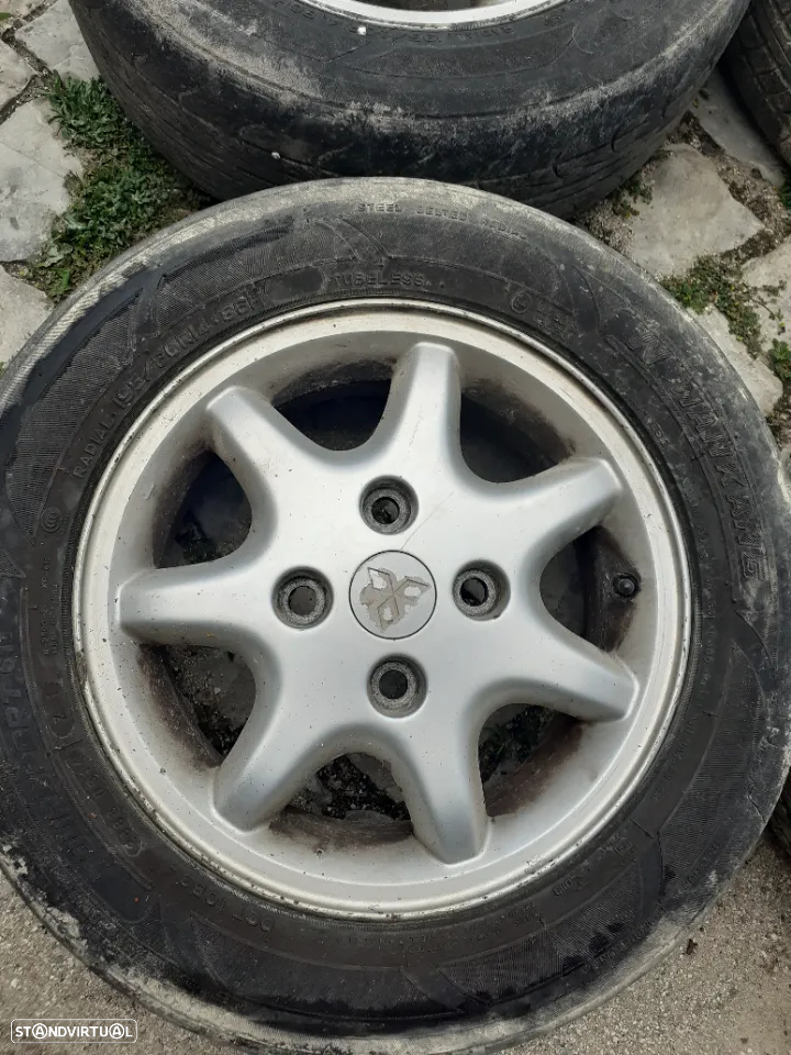 Conjunto jantes 14 mitsubishi carisma ano 2001 - 6