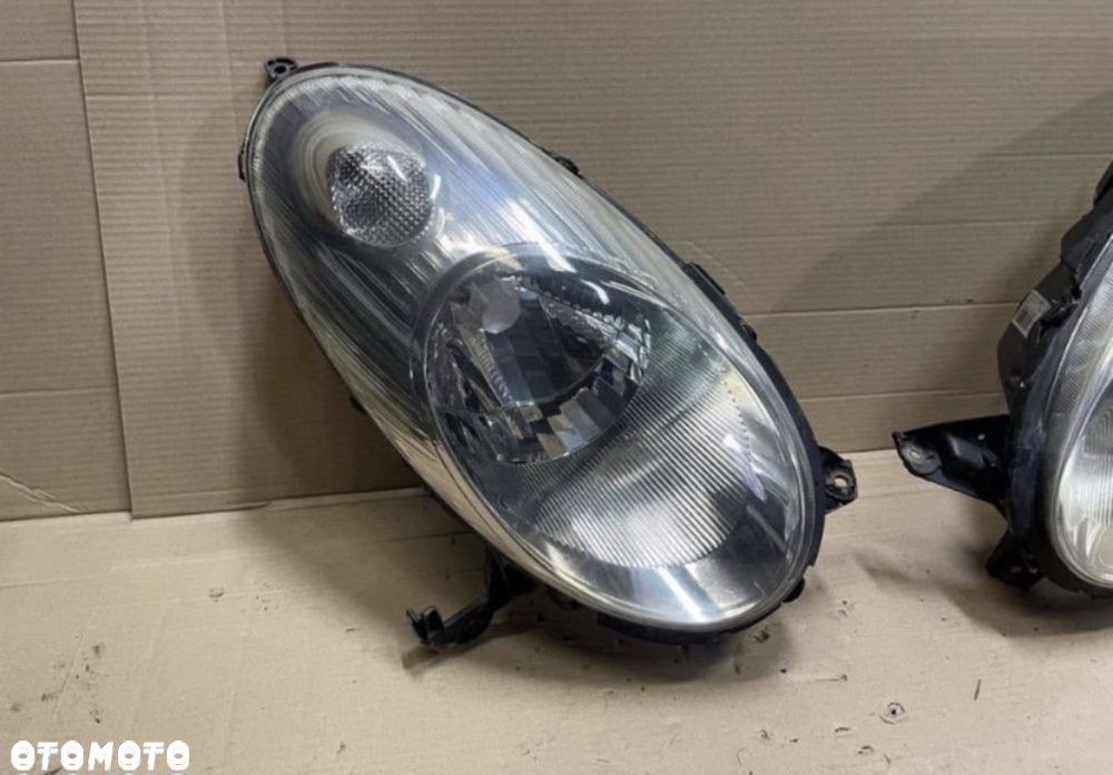 Reflektor lampa przód przednia Nissan Micra k12 - 2