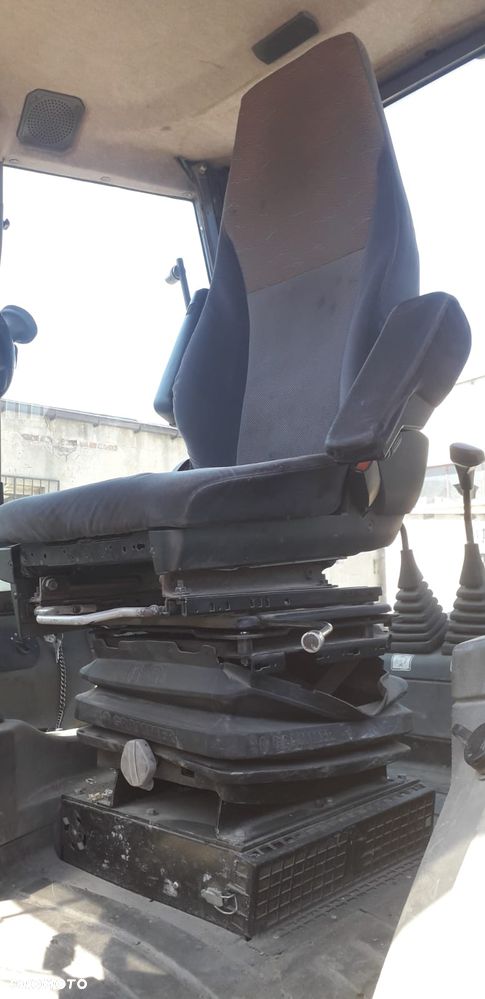 New Holland 110B - 14