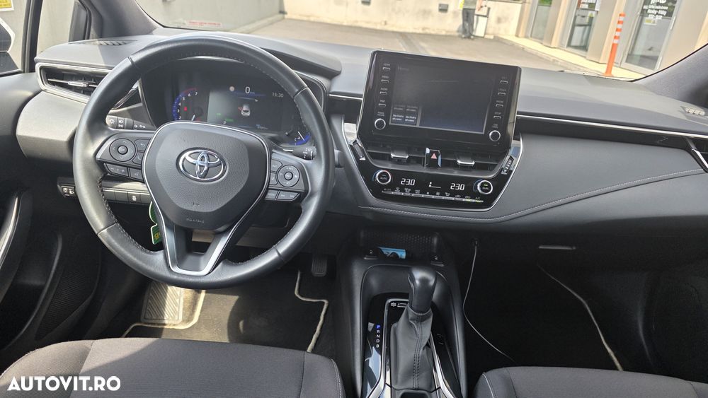 Toyota Corolla 1.8 HSD Business - 8