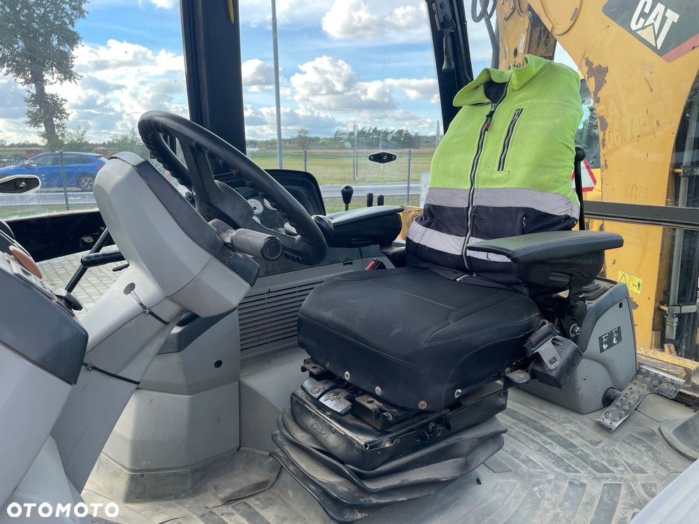 Caterpillar 428E - 11