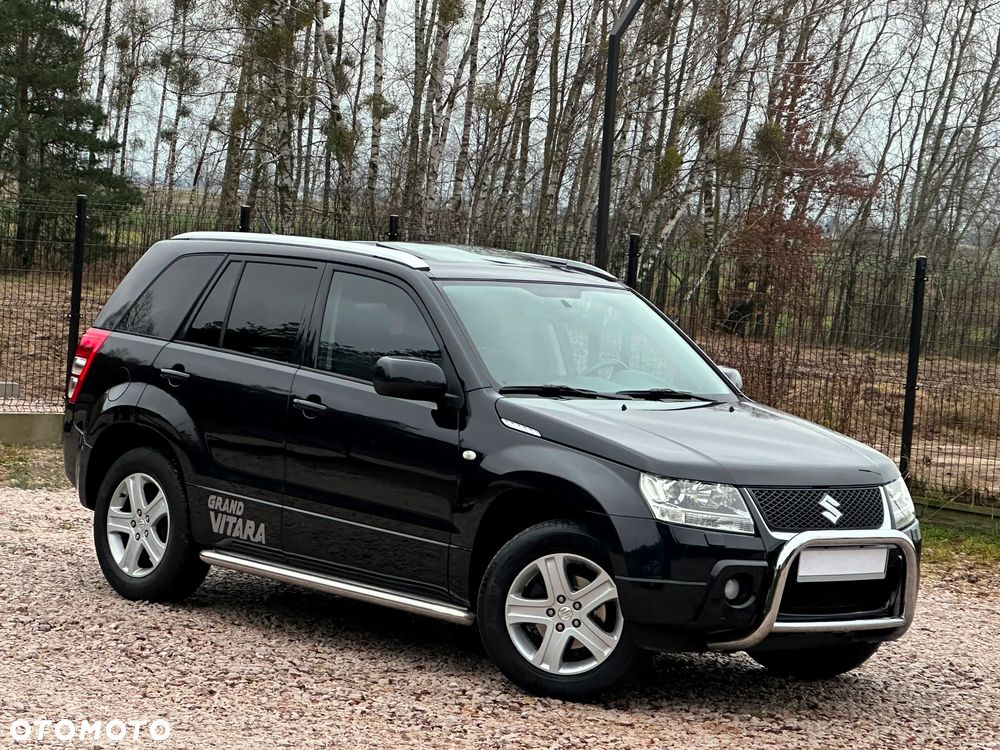 Suzuki Grand Vitara 2.0 Comfort + Family - 1