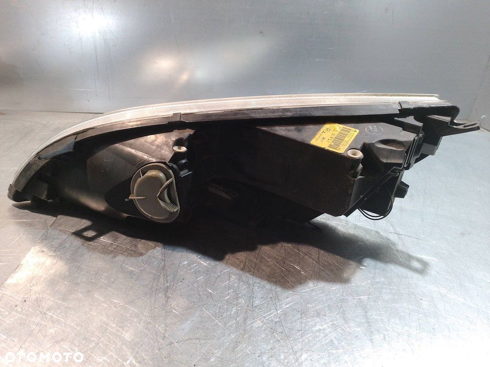 LAMPA PRAWA PRZÓD MITSUBISHI COLT VI 0301208202   MR957354 - 6