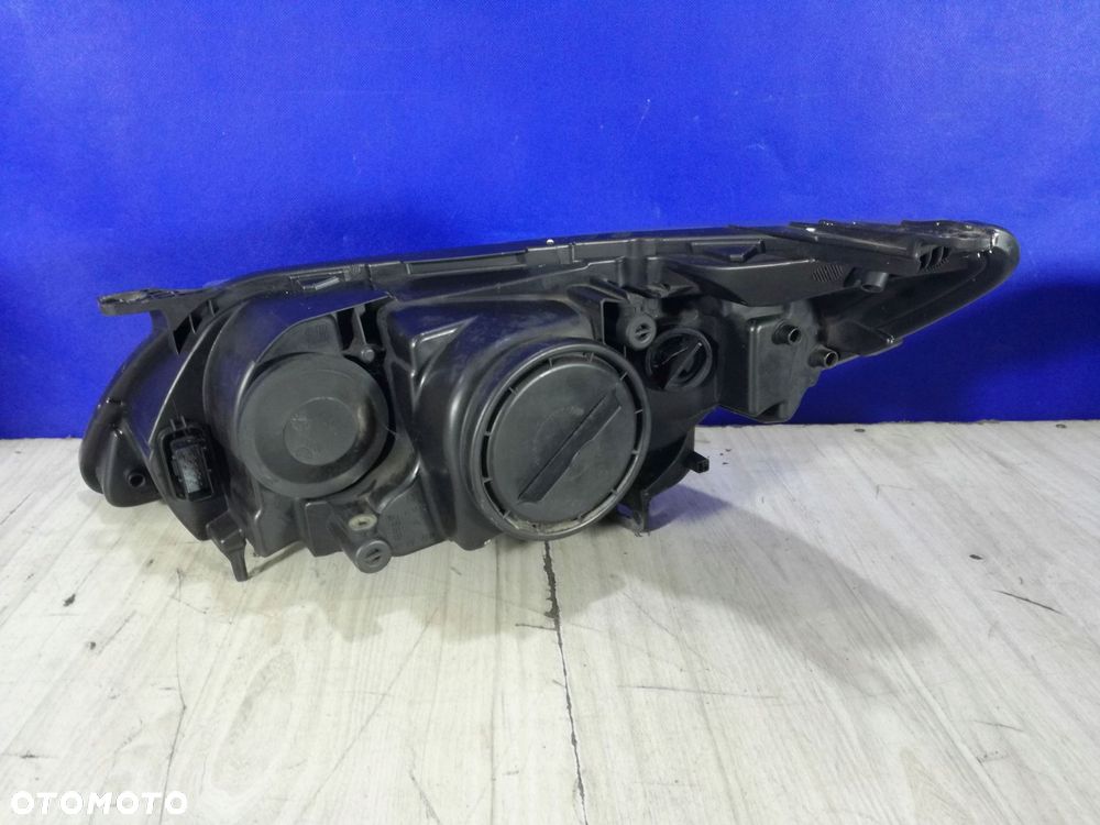 saab 93 9-3 lift lampa reflektor prawa europa 07/12 - 4