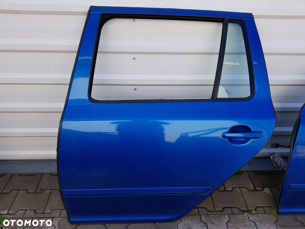 OCTAVIA 2 II 04r- VRS KOMBI DRZWI LEWE TYŁ 9463 - 1