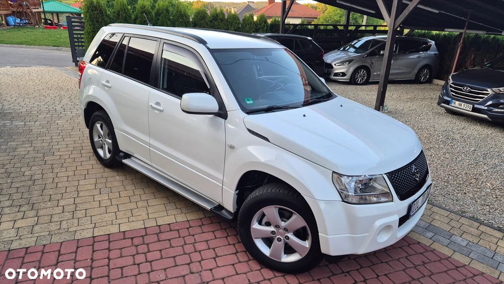 Suzuki Grand Vitara 2.0 Comfort + Family - 3