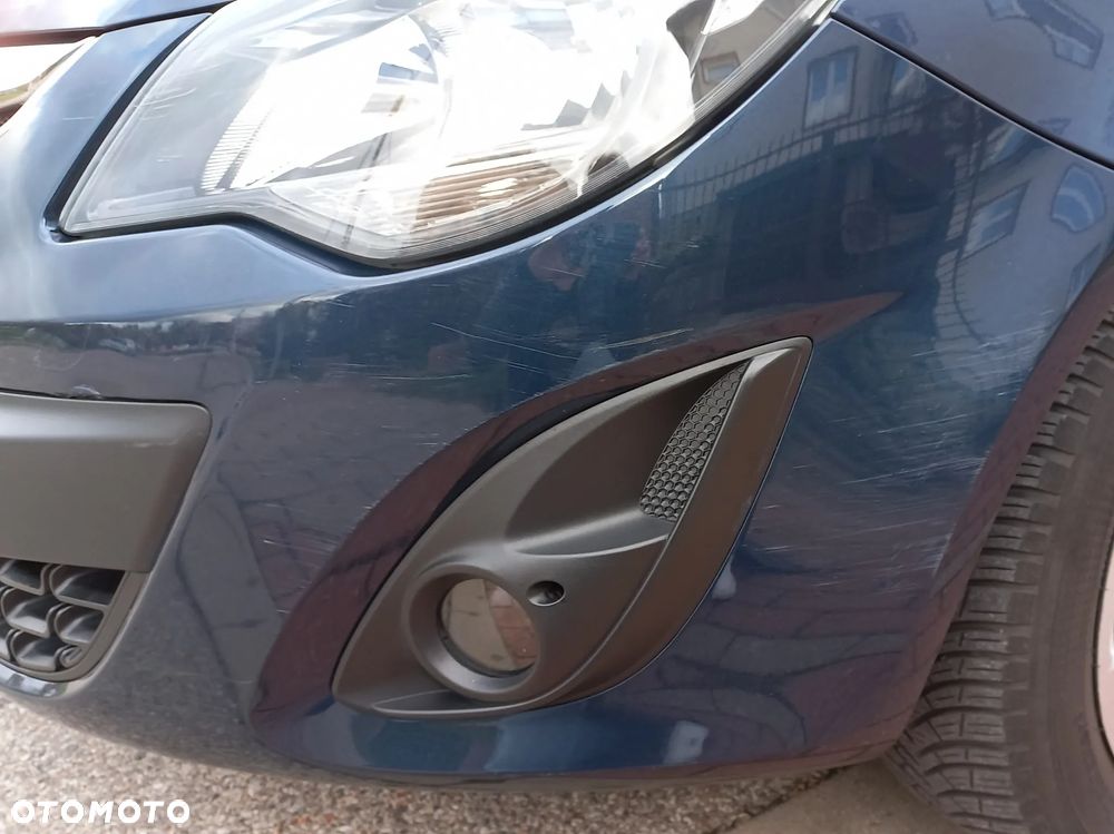 Opel Corsa 1.4 16V Cosmo - 17