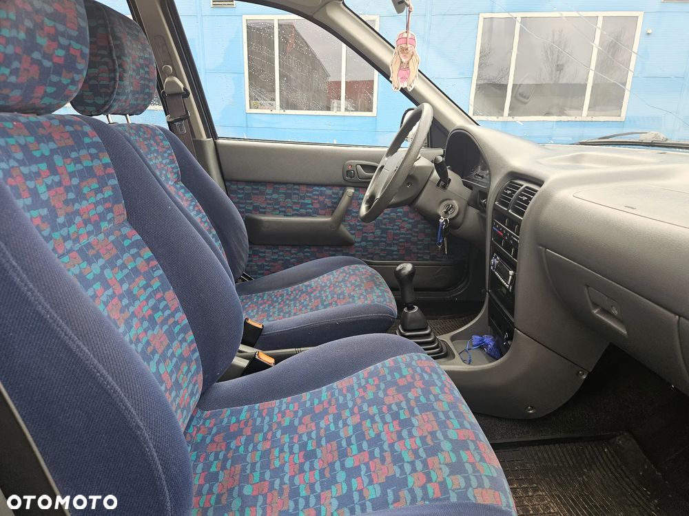 Suzuki Swift 1.0 GLX - 13