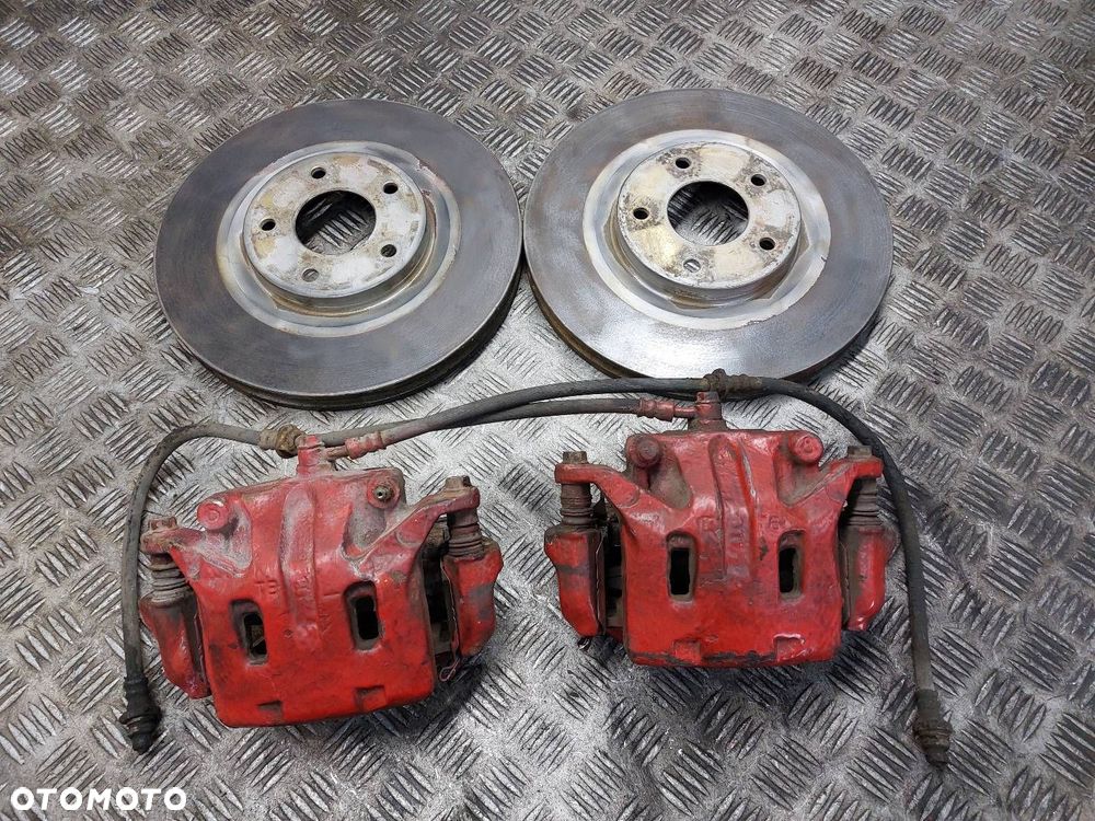 TARCZE HAMULCOWE PRZÓD + KLOCKI + ZACISKI NISSAN QASHQAI I J10 2.0 DCI - 1