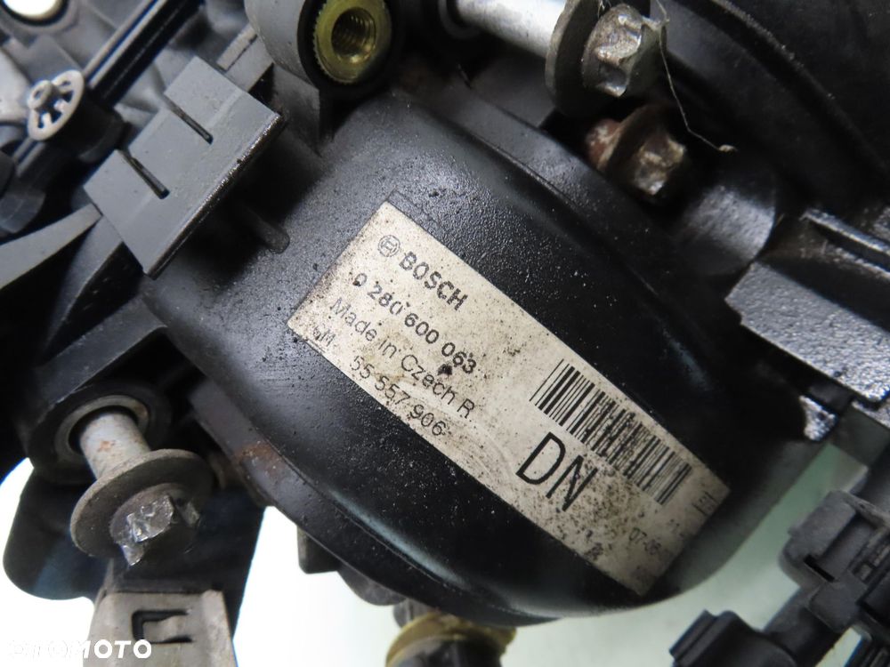 KOLEKTOR SSĄCY OPEL CORSA D 1.2 - Z 12 XEP 0280600063 55557906 - 2