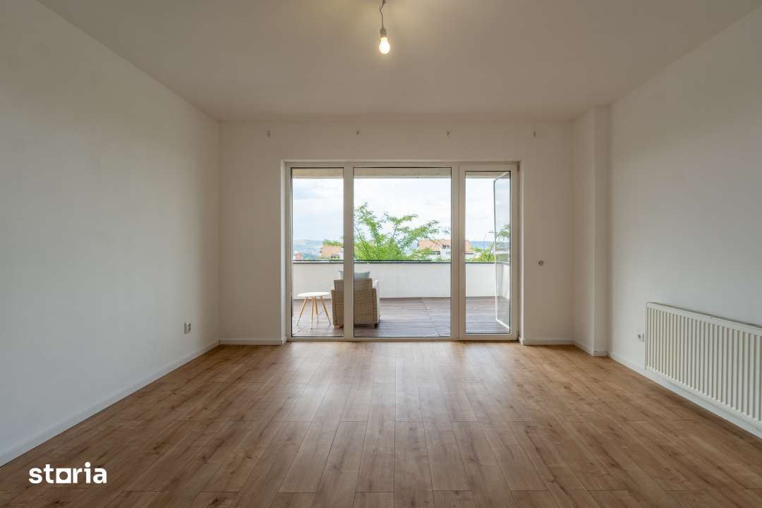 EXCLUSIV 2 camere decomandate, terasa de 60 mp, garaj inclus — fotografia 3