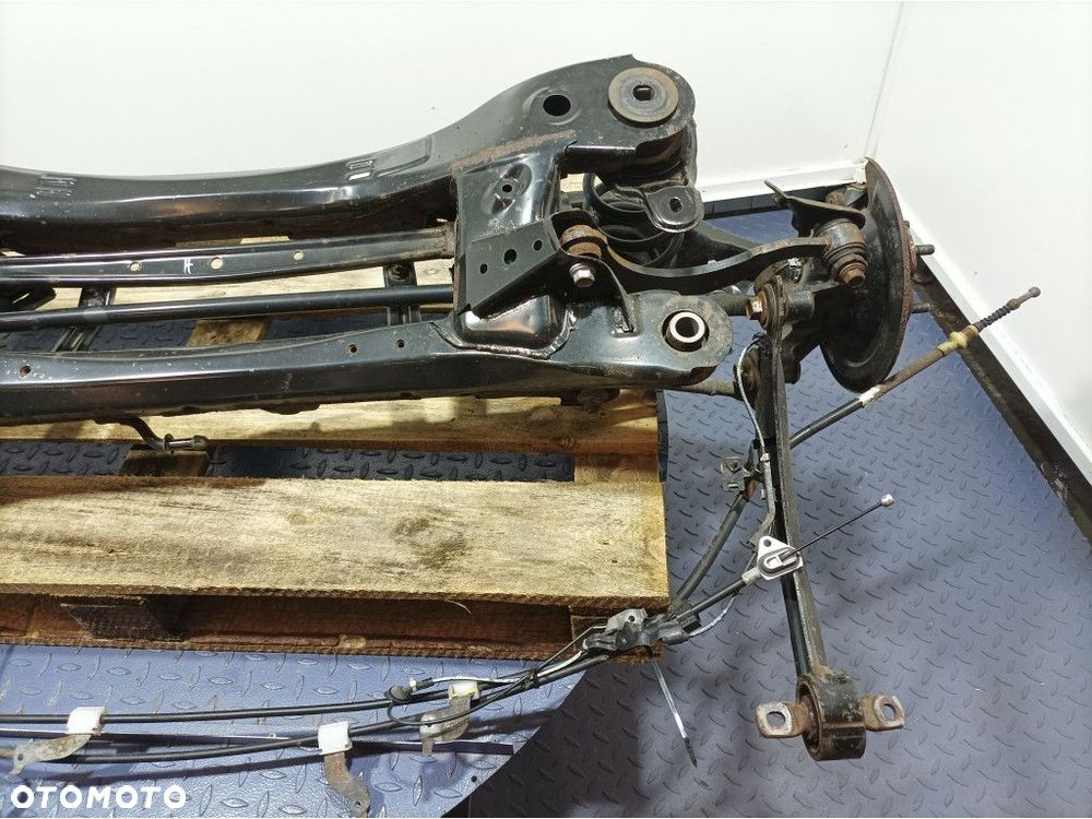 TOYOTA AURIS II LIFT KOMBI BELKA WÓZEK ZAWIESZENIA TYŁ - 5