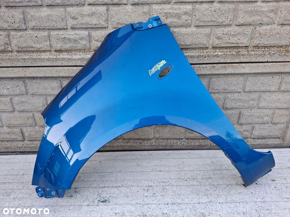 SUZUKI SPLASH 2007-2017 BŁOTNIK PRZEDNI LEWY ORYGINAŁ - 1