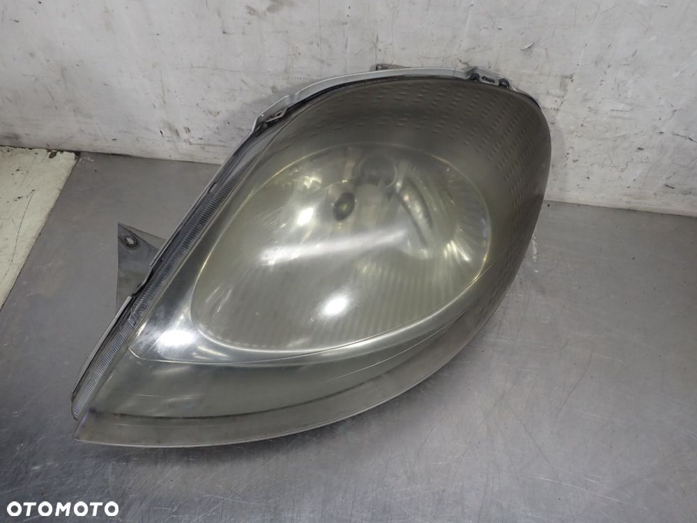 LAMPA LEWA PRZEDNIA RENAULT TRAFIC II 1.9 7700311371 - 2
