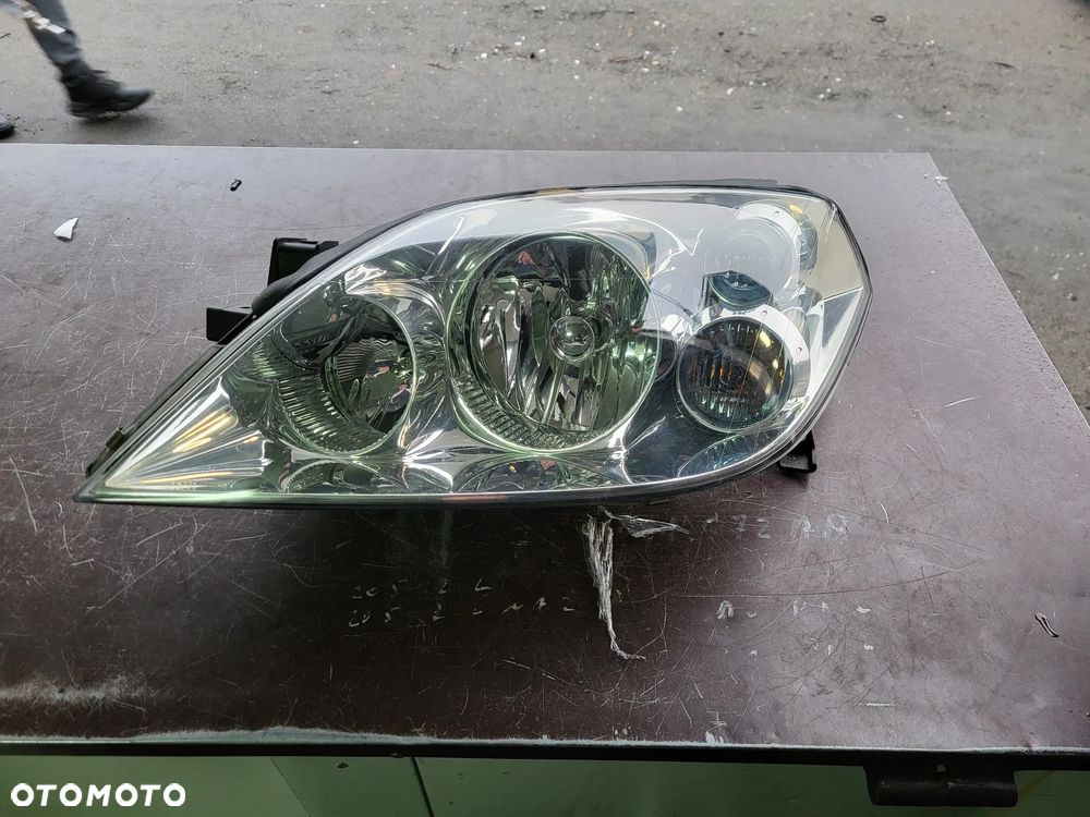 Nissan Primera p12 lewa zwykła z niebieskim - 1