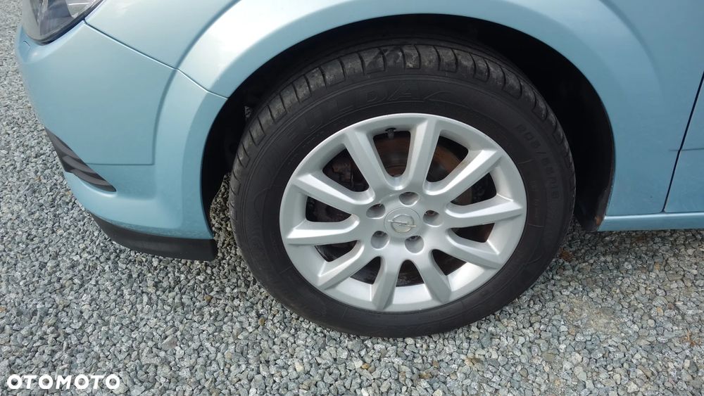 Opel Astra 1.8 Sport - 11
