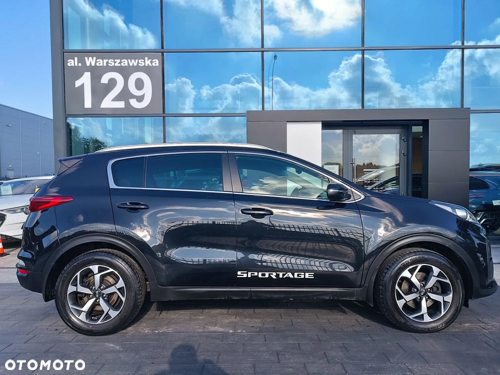 Kia Sportage - 4