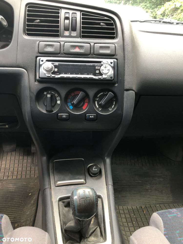 Nissan Primera 1.6 Motion - 10