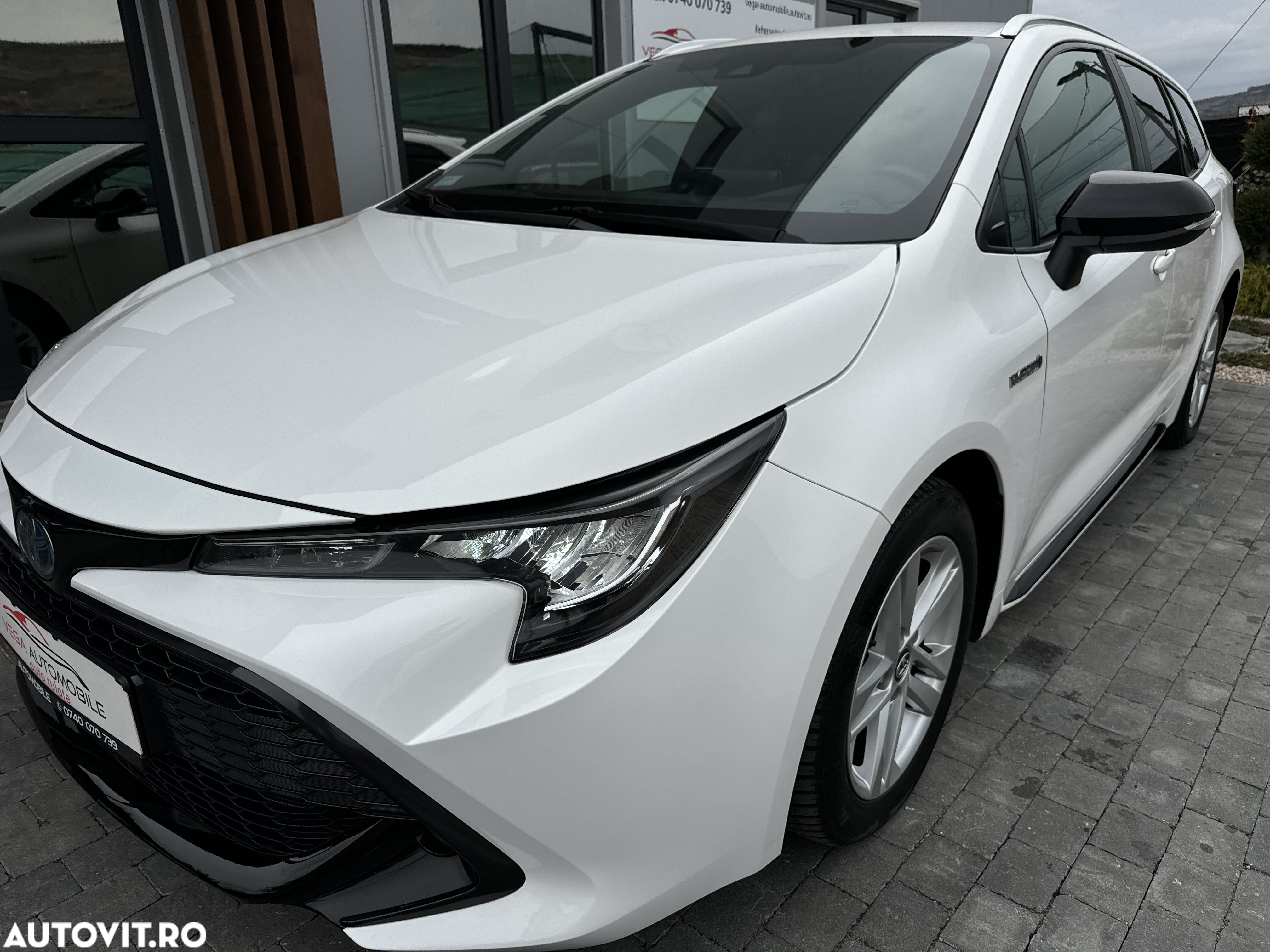 Toyota Corolla 1.8 HSD Business - 23
