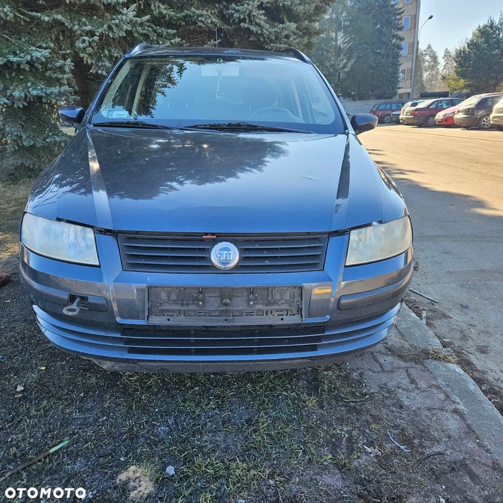Fiat Stilo 1,6 B 76 kW / 103 KM (2003 kombi) (kod lak: 675) pojazd na części: maska, zderzak, drzwi, szyby, lusterka, chłodnica ... - 30