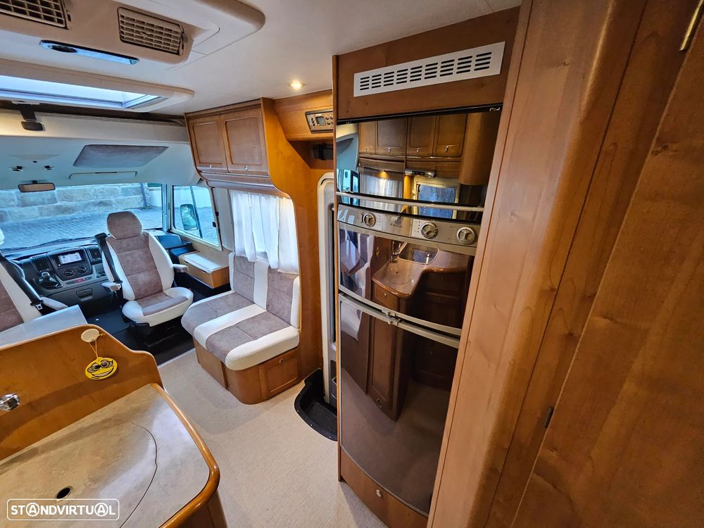 Rapido Le Randonneur 9097F CHASSI AL-KO Cama transversal + BASCULANTE - 28