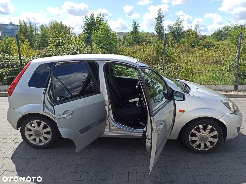 Ford Fiesta 1.4 Ghia - 9