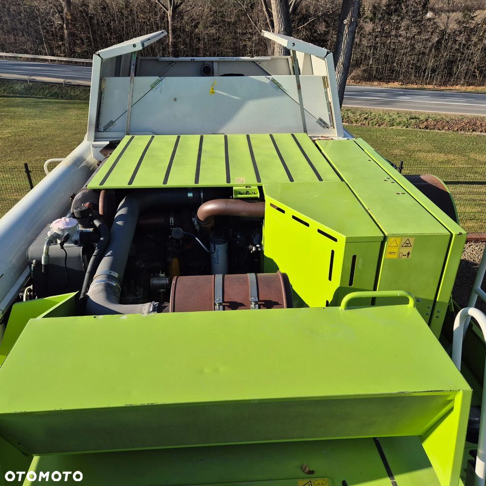 Claas Lexion 650 z hederem - 9