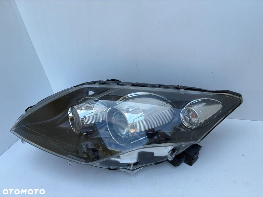 RENAULT LAGUNA III 07-15 LAMPA PRZÓD PRZEDNIA LEWA  EU 26060076R  89902288 - 11