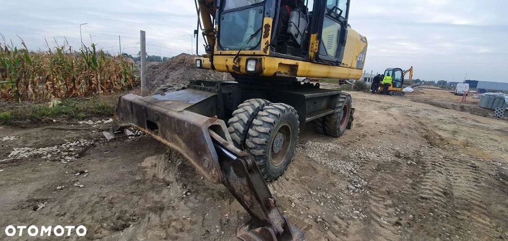 Komatsu PW200 - 1