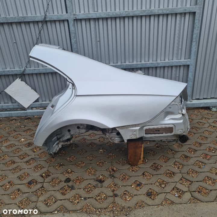 BLOTNIK TYL LEWY POSZYCIE CWIARTKA OKULAR MERCEDES CLS W219 ORYGINALNY DEMONTAZ - 1